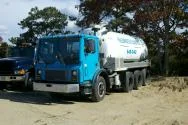 Falmouth Cesspool pumping truck on a job site